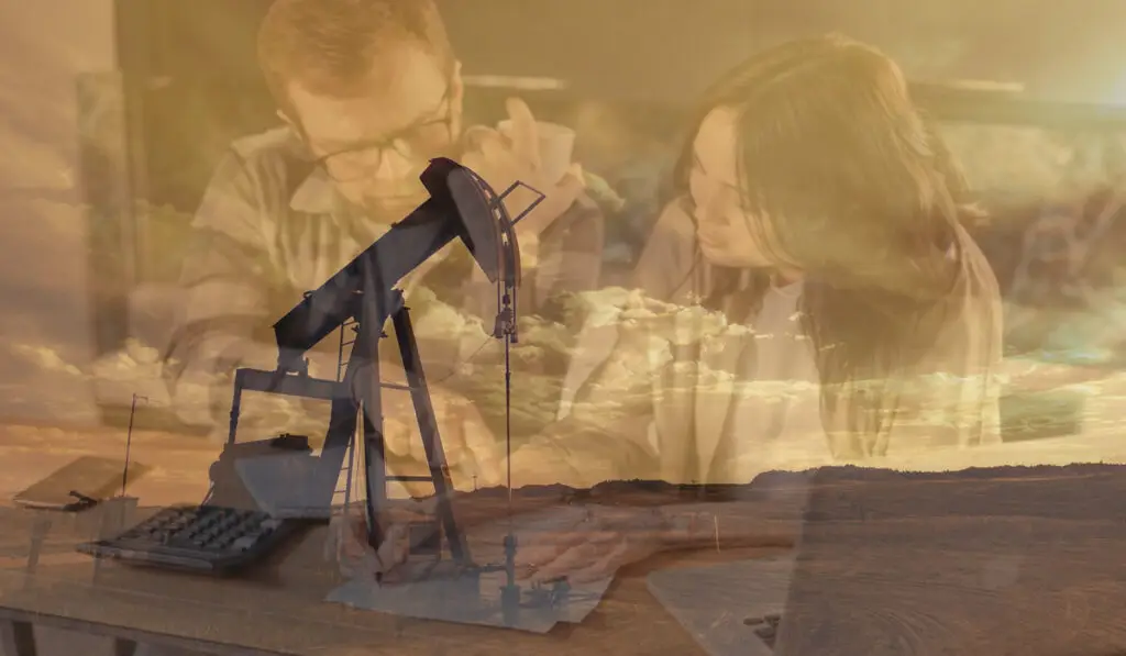 An oil pump jack extracts oil as engineers strategize selling minerals and royalties effectively.