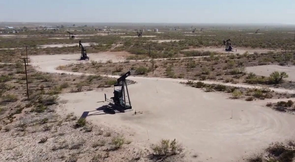 Multiple oil pumpjack in an oil field.